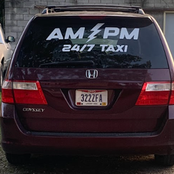 AM PM 24-7 Taxi Service - Red Honda Odyssey rear picture.
