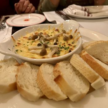 Bistro Niko - Melted Swiss Raclette Cheese - French Near Me - Atlanta, Georgia