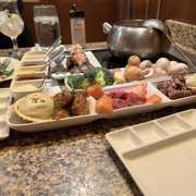 Photo of The Melting Pot - Colorado Springs, CO, United States. We got the coq au vin and the biggest option with lobster tails