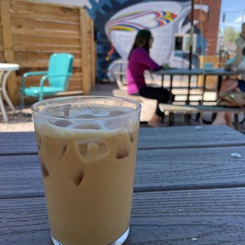 Frankly Coffee - Almond milk latte on patio - Coffee & Tea Near Me - Colorado Springs, Colorado