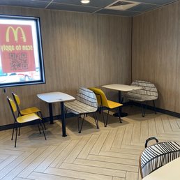 empty tables and chairs in a restaurant