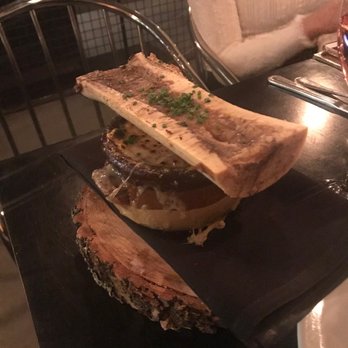Maison Saint-Paul - French onion soup topped with bone marrow - Champagne Bars Near Me - Montreal, Quebec Maison Saint-Paul - French onion soup topped with bone marrow - Champagne Bars Near Me - Montreal, Quebec