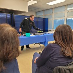 North Merrick Public Library - Chef preparing mushrooms and broccoli rabe on toasts
