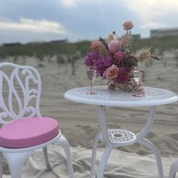 Lily In the Valley Florist - Floral centerpiece made in a seashell