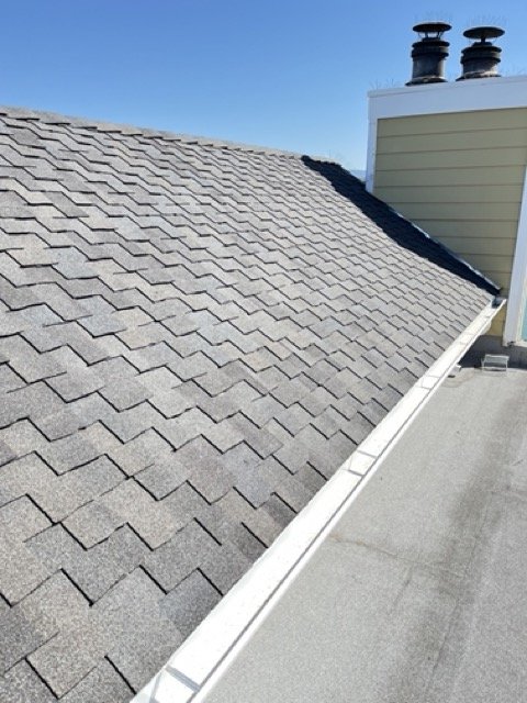 Slide of Rescue Roofing