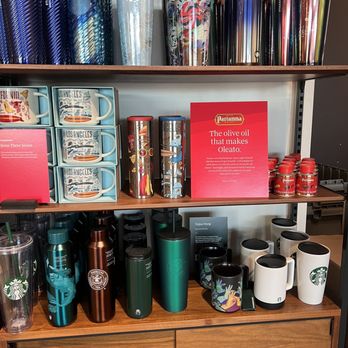 Starbucks - a shelf full of coffee cups and mugs - Coffee & Tea Near Me - Long Beach, California Starbucks - a shelf full of coffee cups and mugs - Coffee & Tea Near Me - Long Beach, California
