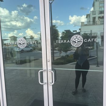 Terra Cafe - Me outside the locked door waiting for my non existent protein smoothie. - Juice Bars & Smoothies Near Me - San Antonio, Texas