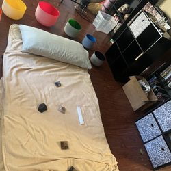 Delta Roe - Tamika set up my space for the session with her crystals and bowls. She didn't judge my home either :)