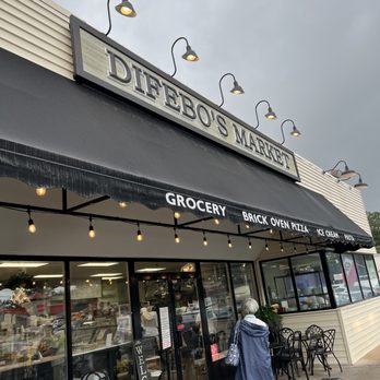 DiFebo's Market - a woman walking past the store - Italian Near Me - Bethany Beach, Delaware