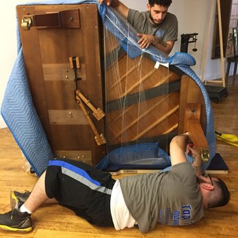Top Tier Moving - Josh reassembling piano - Movers Near Me Top Tier Moving - Josh reassembling piano - Movers Near Me