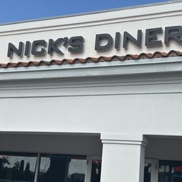 Exterior outside entrance of Nick's 50's Diner - Sign - West Palm Beach, Florida Exterior outside entrance of Nick's 50's Diner - Sign - West Palm Beach, Florida
