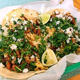 two tacos on a tray two tacos on a tray