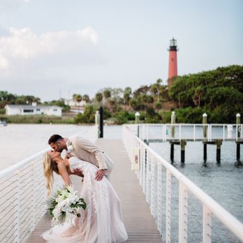 Pelican Club - Bride and groom on dock at Pelican club - Venues & Event Spaces Near Me - Jupiter, Florida Pelican Club - Bride and groom on dock at Pelican club - Venues & Event Spaces Near Me - Jupiter, Florida