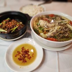 Pho Que Restaurant - Family meal: sweet and sour fish soup and caramelized catfish *** best seller
