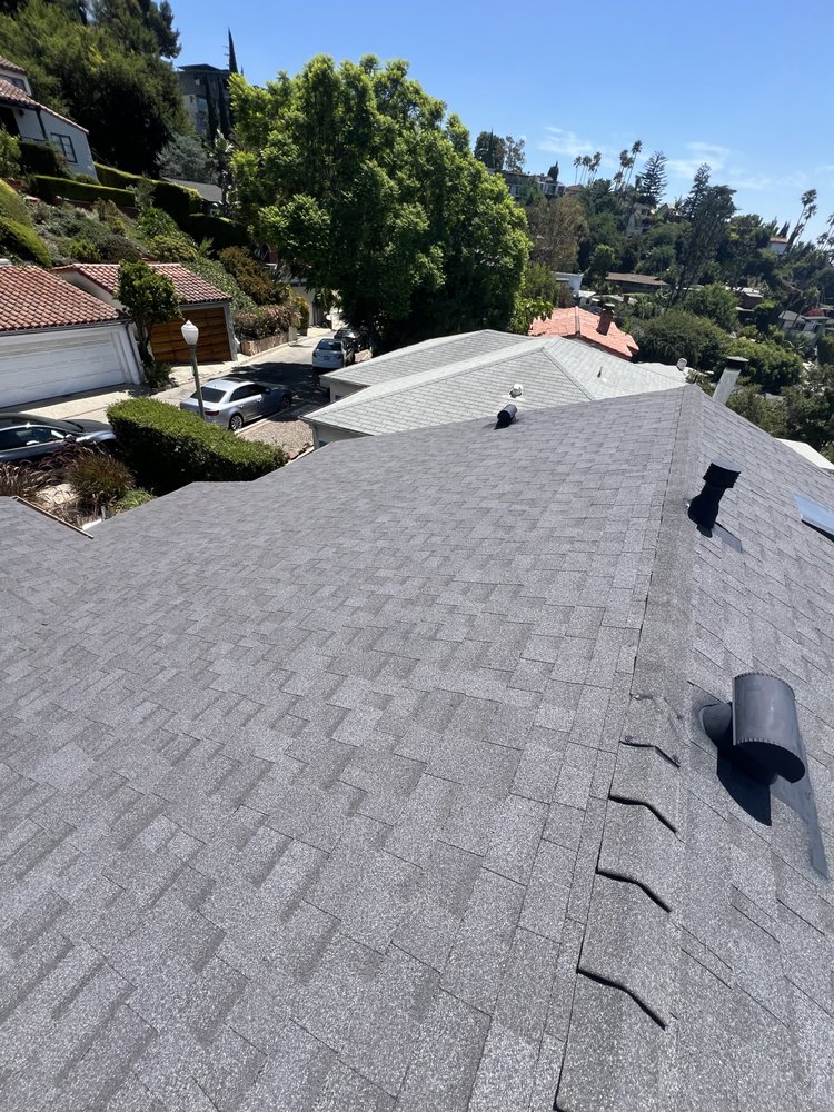Slide of Reign Roofing