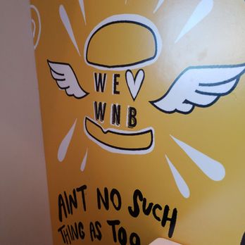 WNB Factory - a burger with wings painted on the wall - Burgers Near Me - Gainesville, Georgia WNB Factory - a burger with wings painted on the wall - Burgers Near Me - Gainesville, Georgia