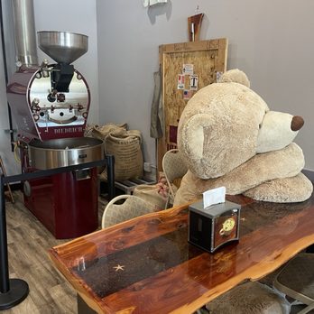 Donut Central & Fuelpresso - Teddy is chillaxin by the bean machine. - Donuts Near Me - Winter Park, Florida