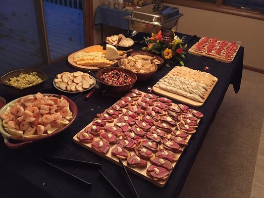 Passed Hors D'oeuvres Catering - $1000 Minimum for Catering & Personal Chef Services. 2 Chefs Catering has been owned & operated by Ryan & Tricia Peterson since 2009. Both attended Le Cordon Bleu in Scottsdale, AZ, where they earned associate degrees in culinary arts. Originally from Hoyt & Mayetta, KS, Ryan & Tricia understand what local clients expect from a quality catering experience & consistently strive to exceed those expectations. They cater events of all sizes & pride themselves on a personalized approach, ensuring each event is special & tailored to the client’s needs. 2 Chefs Catering serves Topeka & the surrounding areas. Head Chef Ryan graduated from culinary school in 2009. His experience includes working at several restaurants in Topeka, KS, & Phoenix, AZ, such as serving as kitchen manager at Blind Tiger Brewery & Top of the Tower, & spending over five years with Aboud’s Catering. In Arizona, Ryan worked at Michael’s Catering & Olives & Ivy. He is passionate about cooking for both friends & clients. Tricia, who also attended culinary school, specializes in baking. She enjoys creating specialty desserts—including crème brûlée, scones, & other confections—for the Millennium Cafe. In addition to her role as baker & front-of-house manager, she manages the website, social media accounts, & administrative tasks for both the Cafe & the catering business. Tricia holds a degree from Washburn University & enjoys writing, reading, & blogging in her free time. Passed Hors D'oeuvres Catering - $1000 Minimum for Catering & Personal Chef Services. 2 Chefs Catering has been owned & operated by Ryan & Tricia Peterson since 2009. Both attended Le Cordon Bleu in Scottsdale, AZ, where they earned associate degrees in culinary arts. Originally from Hoyt & Mayetta, KS, Ryan & Tricia understand what local clients expect from a quality catering experience & consistently strive to exceed those expectations. They cater events of all sizes & pride themselves on a personalized approach, ensuring each event is special & tailored to the client’s needs. 2 Chefs Catering serves Topeka & the surrounding areas. Head Chef Ryan graduated from culinary school in 2009. His experience includes working at several restaurants in Topeka, KS, & Phoenix, AZ, such as serving as kitchen manager at Blind Tiger Brewery & Top of the Tower, & spending over five years with Aboud’s Catering. In Arizona, Ryan worked at Michael’s Catering & Olives & Ivy. He is passionate about cooking for both friends & clients. Tricia, who also attended culinary school, specializes in baking. She enjoys creating specialty desserts—including crème brûlée, scones, & other confections—for the Millennium Cafe. In addition to her role as baker & front-of-house manager, she manages the website, social media accounts, & administrative tasks for both the Cafe & the catering business. Tricia holds a degree from Washburn University & enjoys writing, reading, & blogging in her free time.