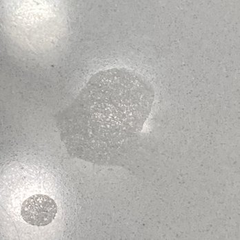 StoneAge Restoration Services - Damaged quartz countertop with chemical etching. - Flooring Near Me - Anaheim, California StoneAge Restoration Services - Damaged quartz countertop with chemical etching. - Flooring Near Me - Anaheim, California