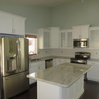 CBE General Contractors - a clean kitchen with stainless steel appliances - General Contractors Near Me CBE General Contractors - a clean kitchen with stainless steel appliances - General Contractors Near Me