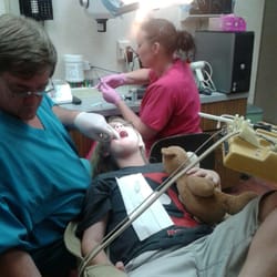 Heuszel Harold K DDS - Dr Heuszel putting on my son's braces