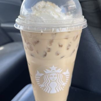 Starbucks - Iced Pecan  Crunch Oatmilk latte with whipped cream it's really good - Coffee & Tea Near Me - Orange, California