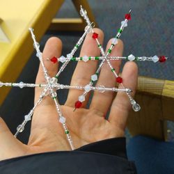 Eggertsville-Snyder Branch Library - While the teens are in a free bead craft class, I get an hour of peace! My daughter's finished beaded snowflake ornaments.
