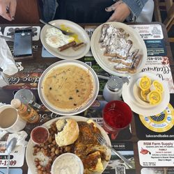 Landing Cafe - Blueberry pancake Chili and cheese omelette with biscuits and gravy and French toast eggs over easy with sausage links!