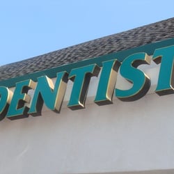 Martin Jeff DDS - Dentist sign above building