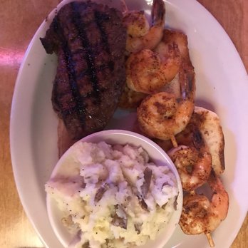 Texas Roadhouse - 8 oz sirloin, grilled shrimp, and mashed potatoes - Steakhouses Near Me - Cookeville, Tennessee Texas Roadhouse - 8 oz sirloin, grilled shrimp, and mashed potatoes - Steakhouses Near Me - Cookeville, Tennessee