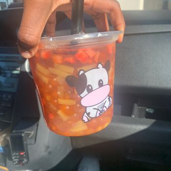 Moo Moo - I got a peach black tea with mango popping boba, peach popping boba, mango jelly and strawberry bits in a chubby cup!! THIS IS ADORABLE - Coffee & Tea Near Me - Elk Grove, California