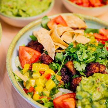 California Tortilla - Crisp greens, blackened chicken, creamy avocado, and a drizzle of sweet mango salsa. - Mexican Near Me - Exton, Pennsylvania California Tortilla - Crisp greens, blackened chicken, creamy avocado, and a drizzle of sweet mango salsa. - Mexican Near Me - Exton, Pennsylvania