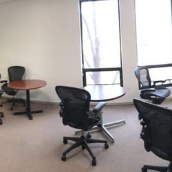 Metropolitan Elite Gymnastics & Athletics - DC - Waiting room. There's a window that overlooks the gym area.