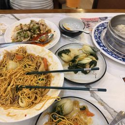Juicy pork dumplings , crispy pan fried noodles with chicken, spicy wontons Juicy pork dumplings , crispy pan fried noodles with chicken, spicy wontons