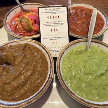 La Popular - Salsa flight (top left is very spicy) - Mexican Near Me - Redlands, California La Popular - Salsa flight (top left is very spicy) - Mexican Near Me - Redlands, California