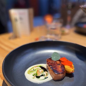 Lazy Bear - California King Salmon which included almonds steeped in cream (so creative and delicious); fluffy, light and tender.  Excellent and gorg - New American Near Me - San Francisco, California