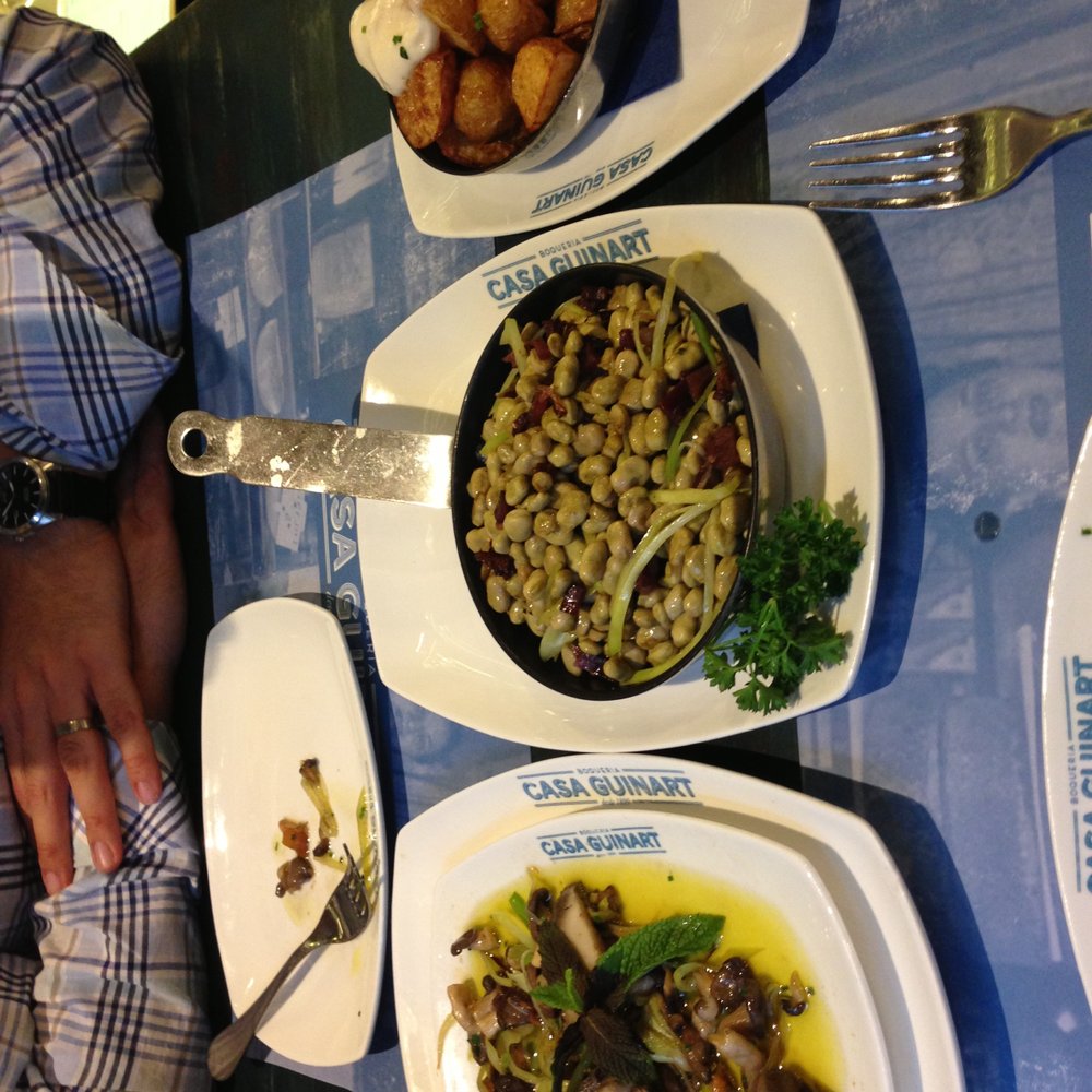 Casa Guinart - From left to right: mushrooms, bacon and beans in olive oil, patatas fritas. - Tapas Bars Near Me - Barcelona, B Casa Guinart - From left to right: mushrooms, bacon and beans in olive oil, patatas fritas. - Tapas Bars Near Me - Barcelona, B