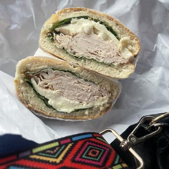Bagel House IV - a bagel sandwich with a bite taken out of it - Breakfast & Brunch Near Me - Jackson Heights, New York Bagel House IV - a bagel sandwich with a bite taken out of it - Breakfast & Brunch Near Me - Jackson Heights, New York