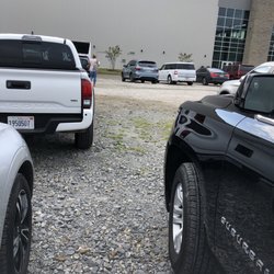 LakePoint Champions Center - A year later and they're still charging $5/day to park in a sketchy gravel/grass field. Pave the damn lot, already.