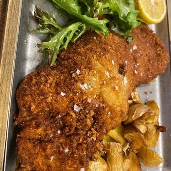 Howling Wolf Bar & Eatery - Tender Pork Schnitzel and I would order this again and again - Sports Bars Near Me - Miami, Florida Howling Wolf Bar & Eatery - Tender Pork Schnitzel and I would order this again and again - Sports Bars Near Me - Miami, Florida