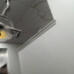 Great Expressions Dental Centers - Pasadena - Water spots on ceiling were only thing to look at bc there was no art on walls