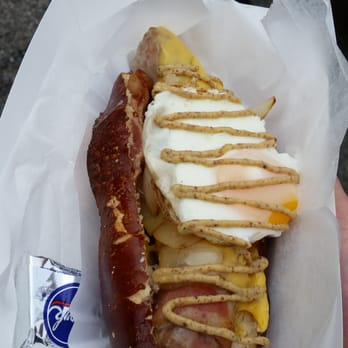 Federal City Brothers - a hand holding a hot dog - Food Trucks Near Me Federal City Brothers - a hand holding a hot dog - Food Trucks Near Me