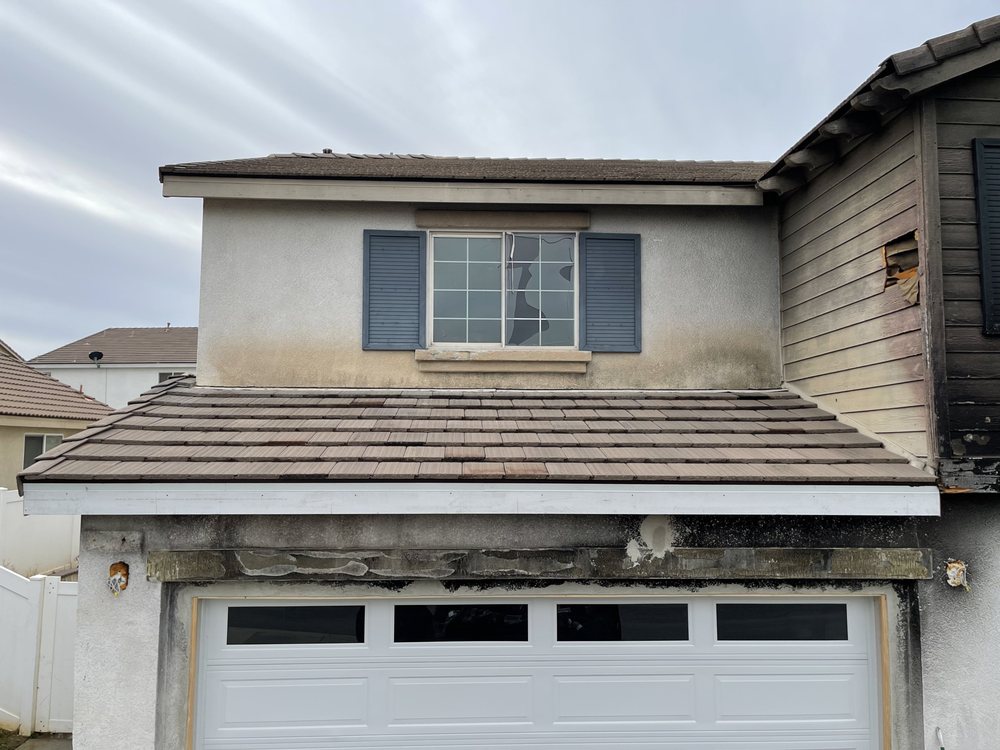 Slide of Oscar Roofing  services