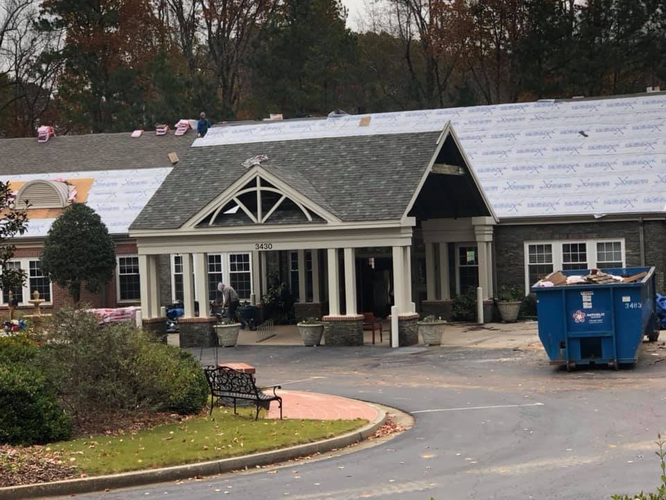 Slide of AMI Roofing