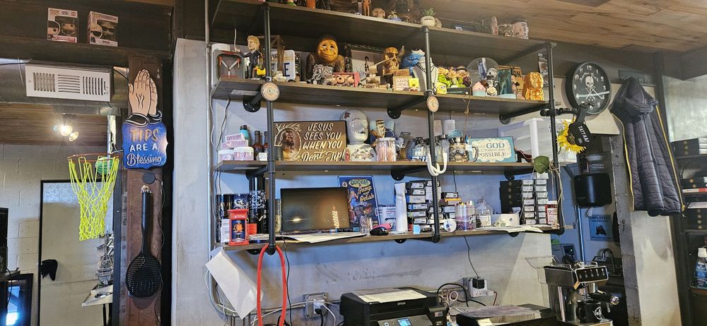 Saved By Grace Tattoo Studio Logo