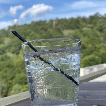 The Rooftop Bar - a glass of water with a straw in it - Bars Near Me - Hot Springs, Arkansas