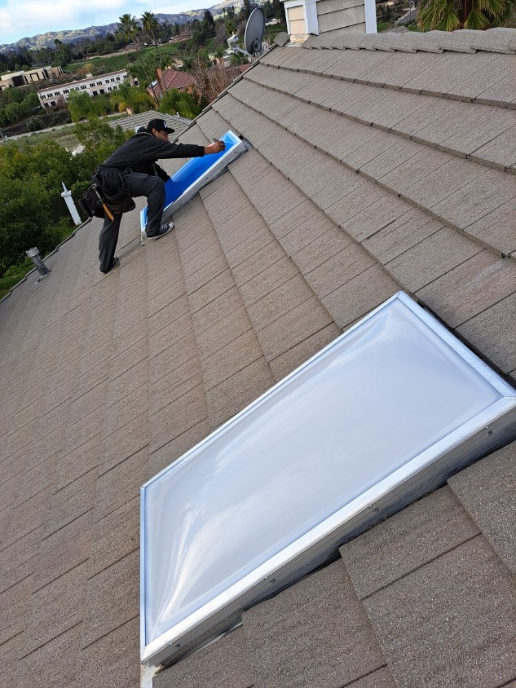 Slide of Eleazars Roofing