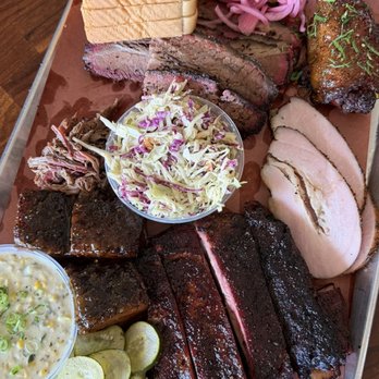 Interstellar BBQ - brisket, peach tea glazed pork belly, pork spare ribs, turkey, creamed corn, jalapeño slaw - Barbeque Near Me - Austin, Texas