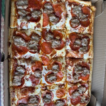Rocky Rococo - Large pizza with Sausage and pepperoni - Pizza Near Me - Glendale, Wisconsin Rocky Rococo - Large pizza with Sausage and pepperoni - Pizza Near Me - Glendale, Wisconsin