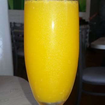 CALI - Tampa Palms - Mango mimosa - New American Near Me - Tampa, Florida CALI - Tampa Palms - Mango mimosa - New American Near Me - Tampa, Florida